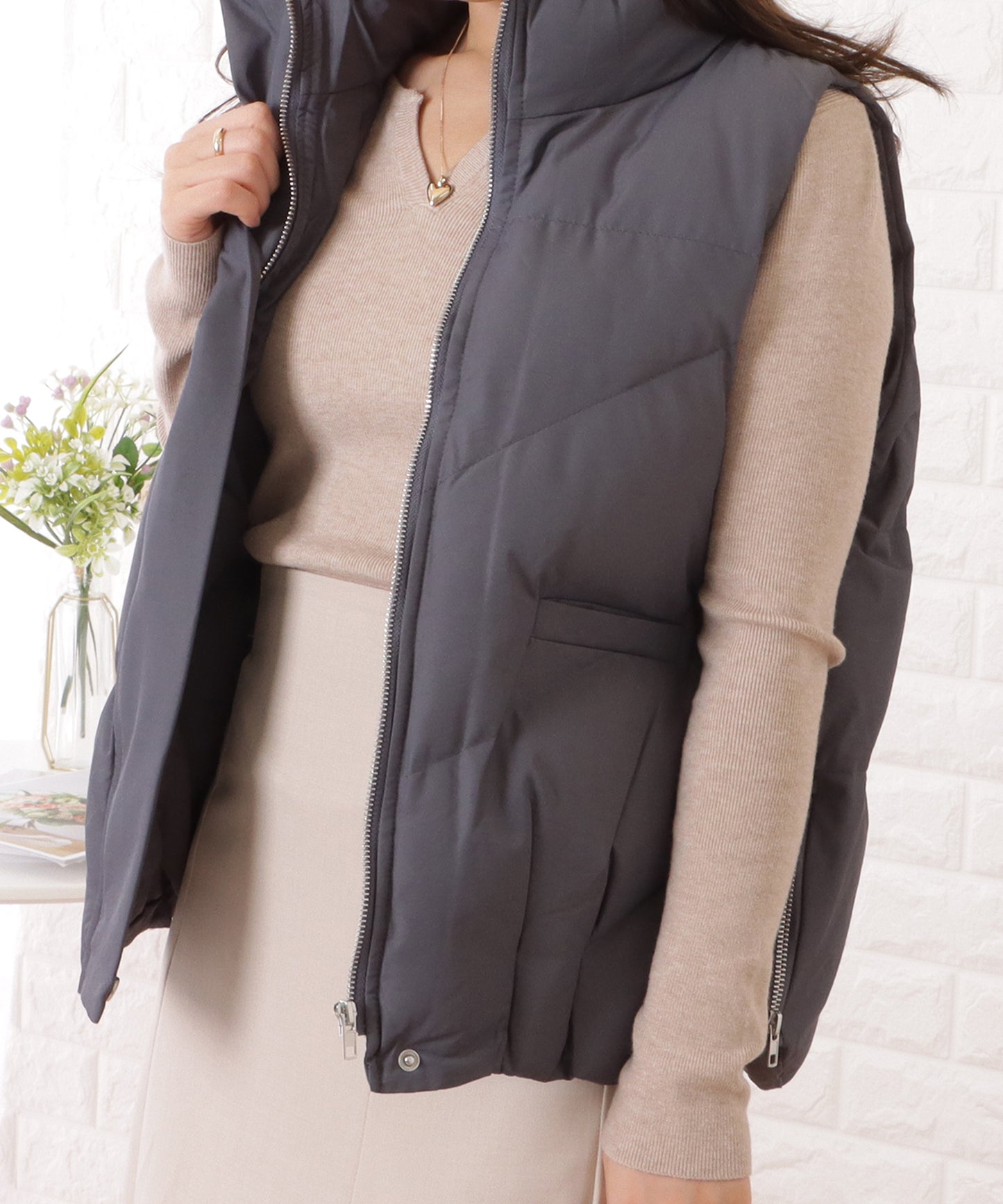 スタンドカラージップアップキルティングベスト