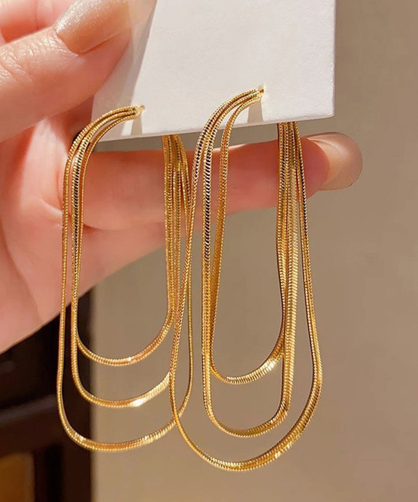 3連 スネークチェーン タッセル フリンジ ピアス