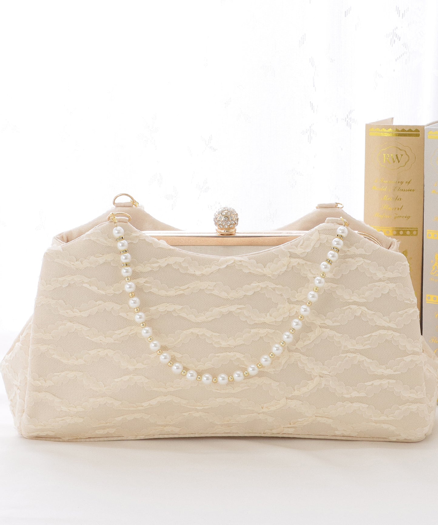 パールハンドルがま口レースパーティーバッグ