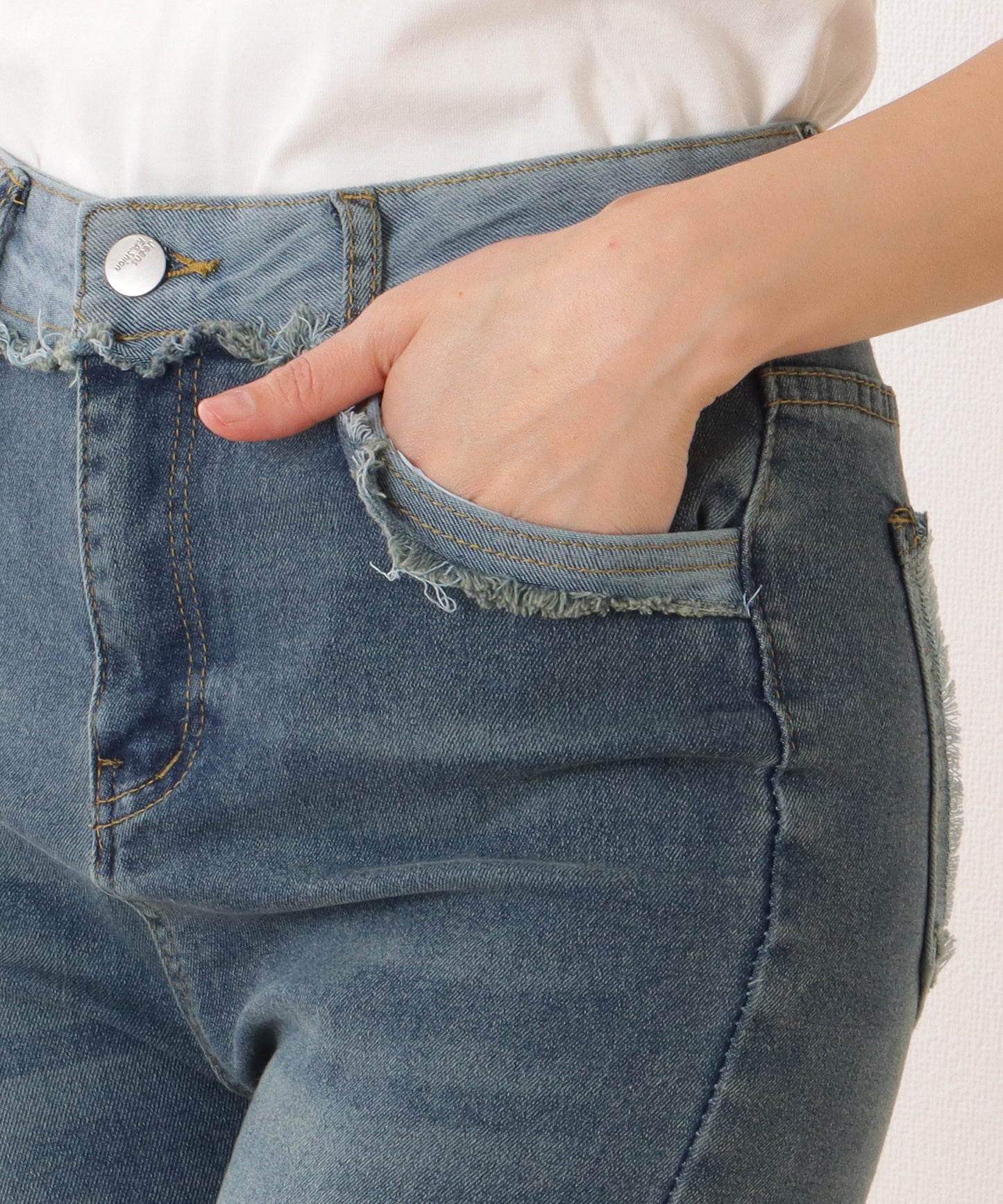 裾フリンジ スリム フレア デニム パンツ