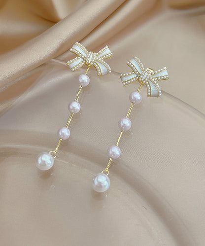 パール リボン ロング チェーン ピアス