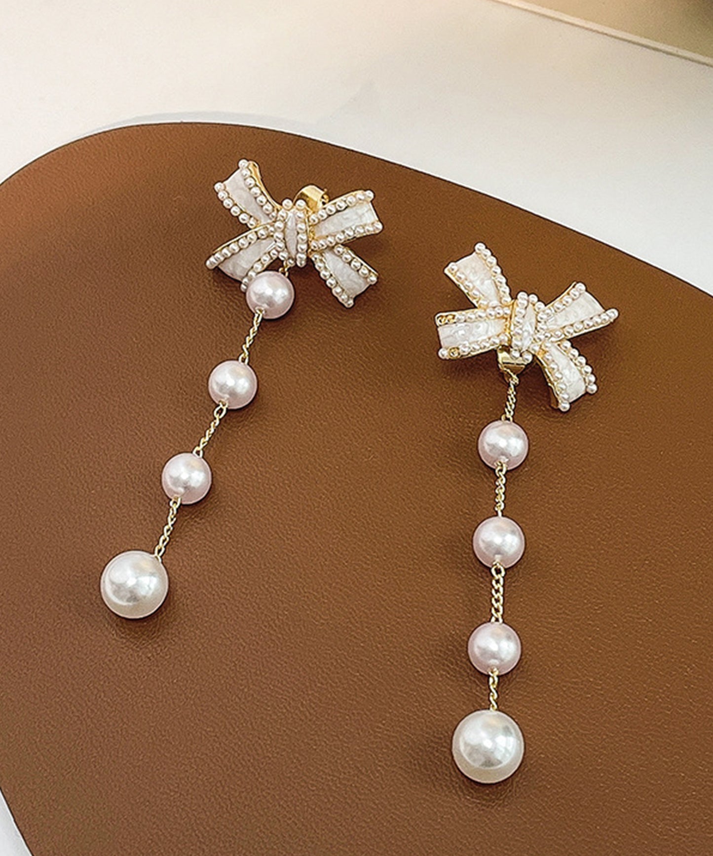 パール リボン ロング チェーン ピアス