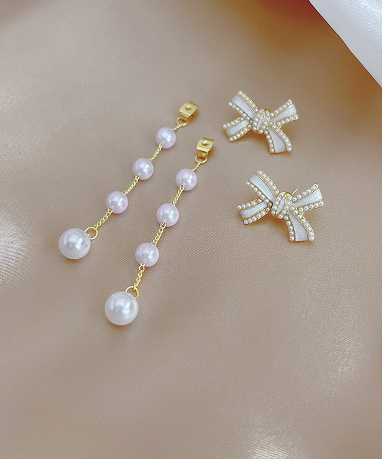 パール リボン ロング チェーン ピアス