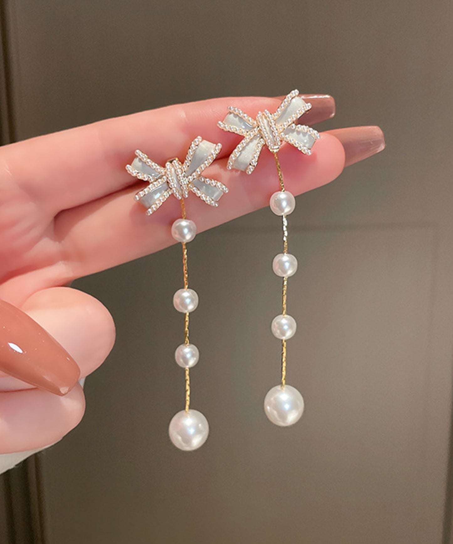 パール リボン ロング チェーン ピアス