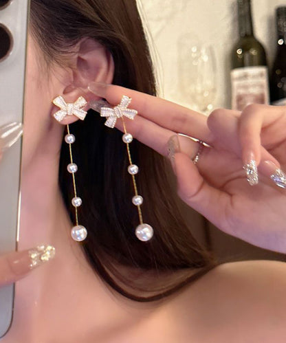 パール リボン ロング チェーン ピアス