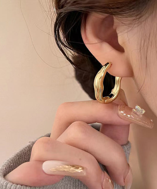 ボリューム ウエーブライン メタリック フープ ピアス