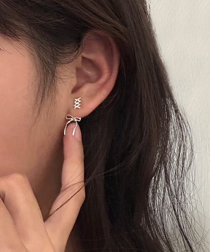 メタリック レースアップ リボン デザイン ピアス