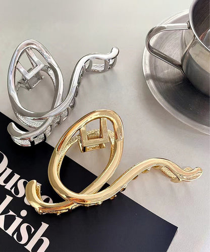 メタリック ウエーブ ライン ヘア バンスクリップ