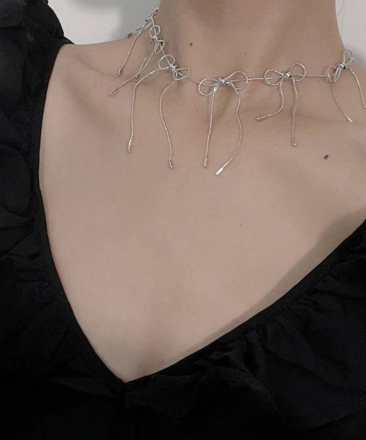 メニーリボン メタリック デザイン ショート ネックレス