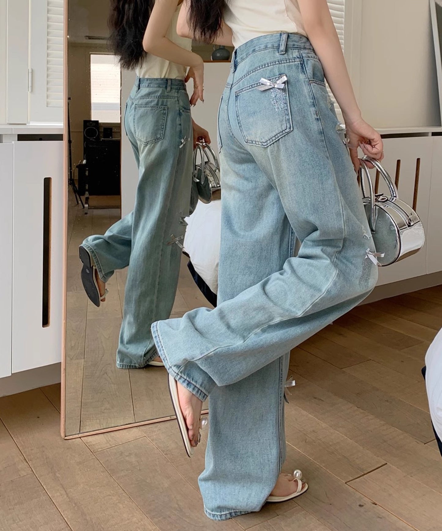 ウォッシュ加工 ダメージ リボン付き ハイウエスト デニムパンツ