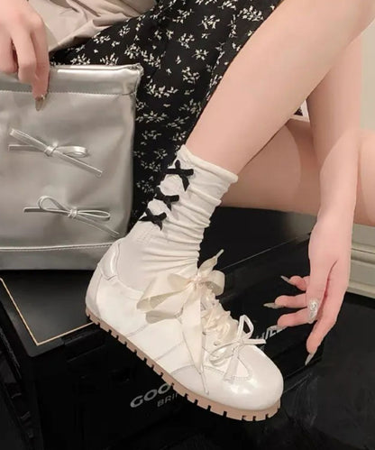 異素材 メタリック リボン付き ローカット スニーカー